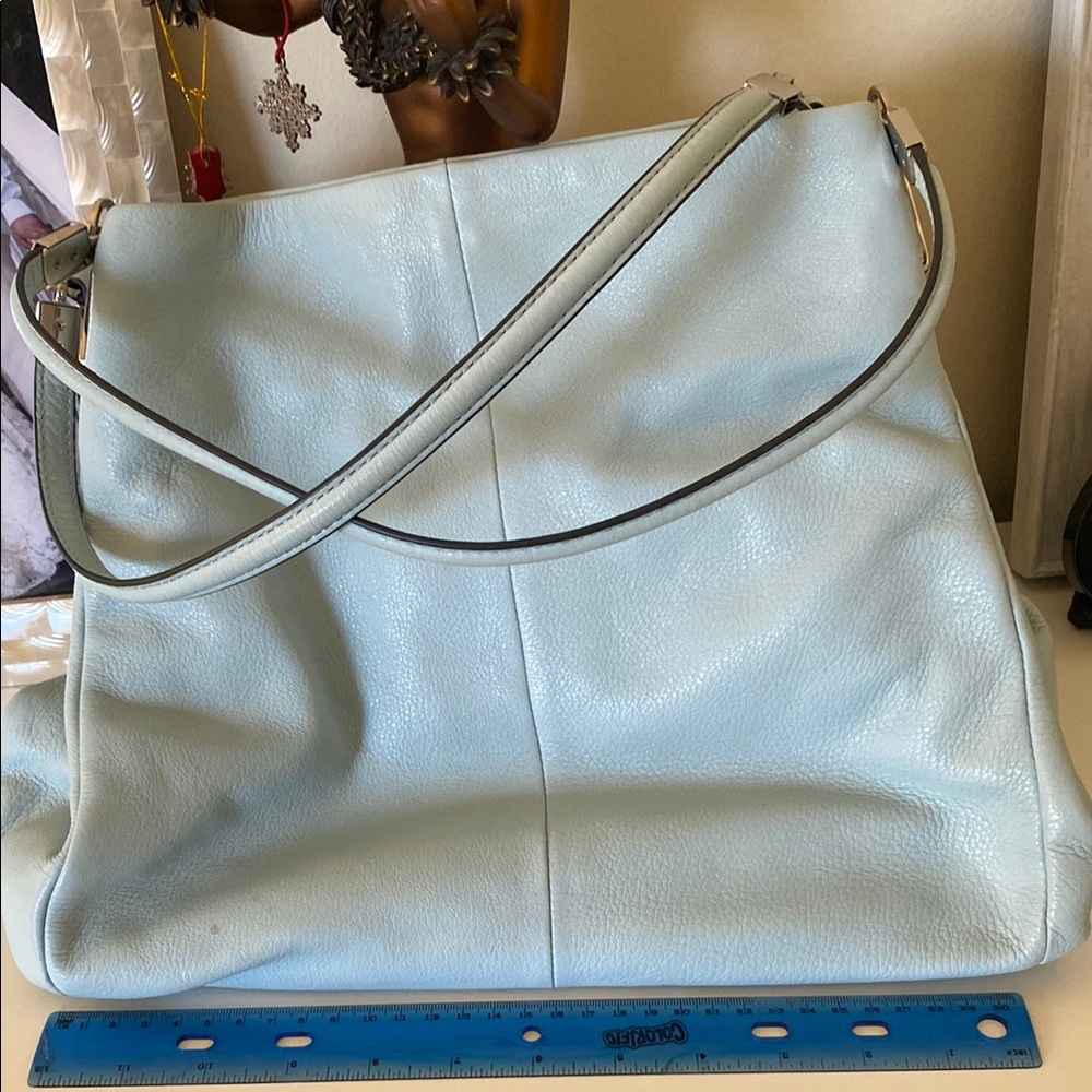 Light Blue Leather Women's coach bag. Lots of compartments for organization.